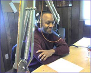 Gregory Anderson speaking at radio station